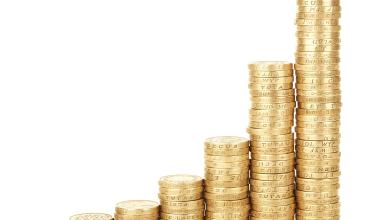 Make Tax Day Better Next Year with the NC Home Advantage Tax Credit A stack of gold coins