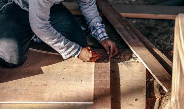 a man working on a house