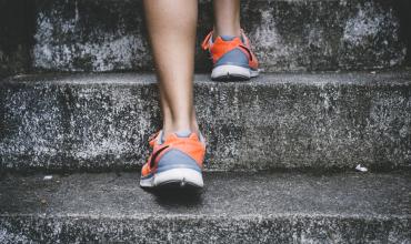 feet running up a flight of stairs