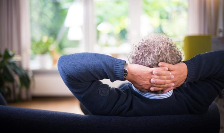 Use Quarantine Time to Prepare for Home Ownership An older man relaxing on a couch