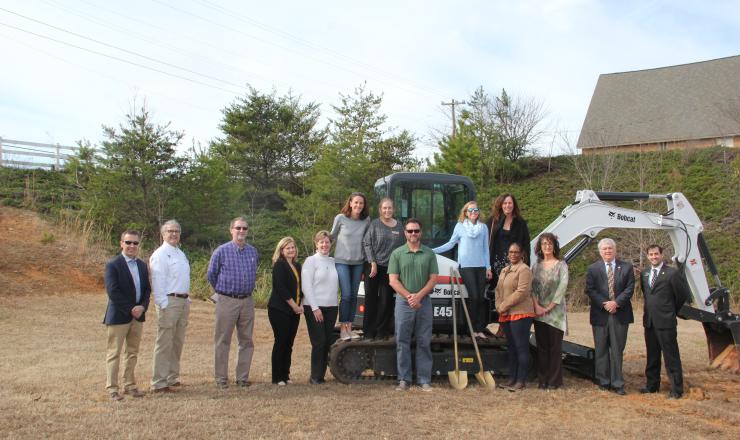 People breaking ground on the project