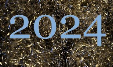 What First-Time Home Buyers Can Expect from the Housing Market in 2024 The number 2024 on top of confetti