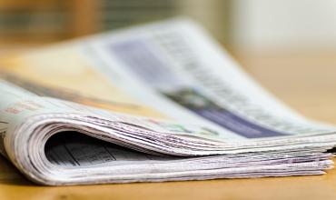 A newspaper on a desk