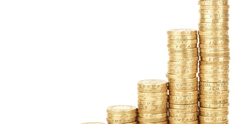 Make Tax Day Better Next Year with the NC Home Advantage Tax Credit A stack of gold coins