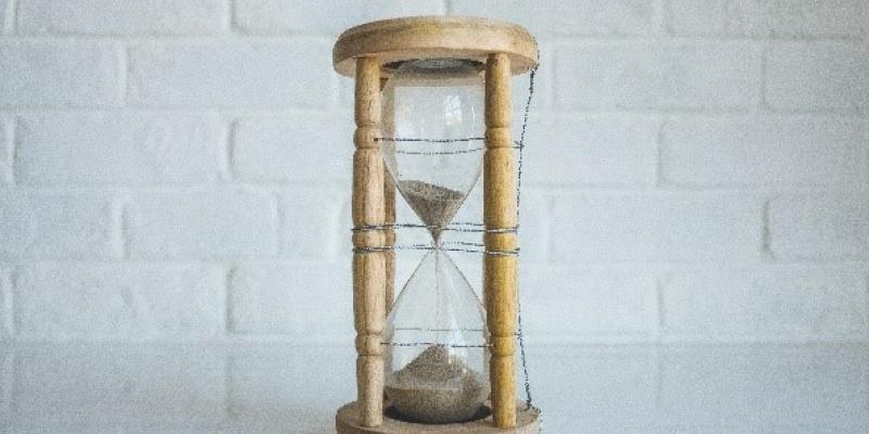 Policy Matters Blog An hour glass with a white brick background