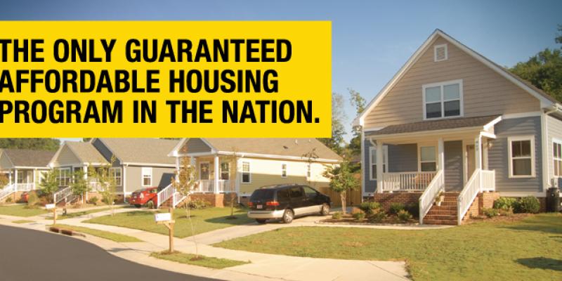 Photo of houses with text over it reading "the only guaranteed affordable housing program in the nation"