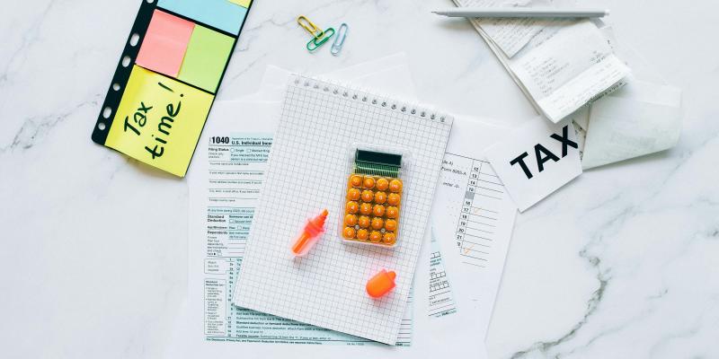 Calculator, tax form and receipts